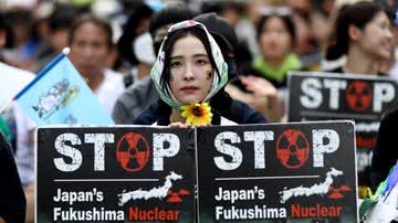 Manifestante sul-coreana em protesto sobre mudanças climáticas - Getty Images