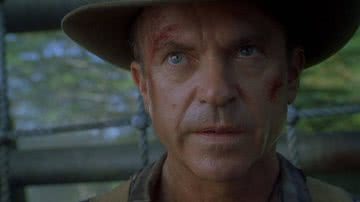 Cena de 'Jurassic Park' (1993) com o personagem Alan Grant, interpretado por Sam Neill - Reprodução/Universal Studios
