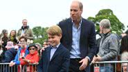 O príncipe George ao lado do pai, William - Getty Images