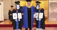 Robôs recebendo diplomas de estudantes que estão em quarentena - Universidade Business Breakthrough
