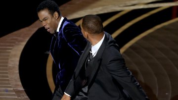 Momento em que Will Smith acerta um tapa em Chris Rock, durante o Oscar 2022 - Getty Images