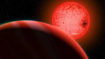 Representação artística do grande planeta gasoso, em primeiro plano, e da estrela TOI-5205 - Divulgação/Katherine Cain/Carnegie Institution for Science