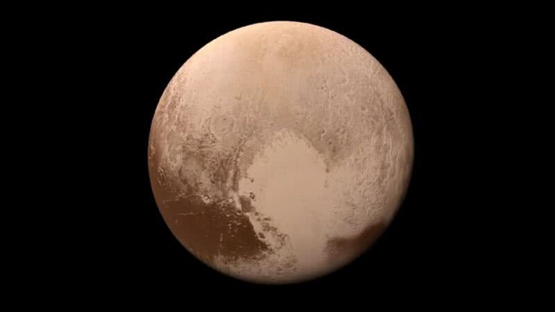 Fotografia colorida de Plutão, o planeta-anão - Domínio Público via Wikimedia Commons