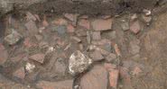 Um poço com muitos resíduos de cerâmica - Instituto Nacional de Pesquisa Arqueológica Preventiva (Inrap)