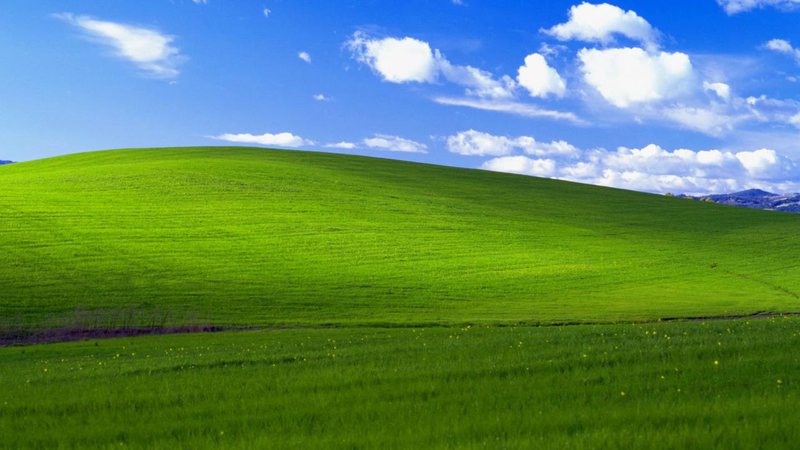 A memorável paisagem do wallpaper 'Alegria', padrão no Windows XP - Divulgação / Microsoft / Corbis