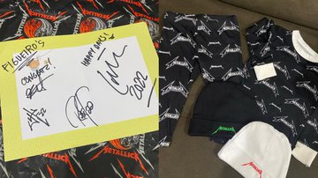 Cartão com autógrafos e algumas roupinhas enviadas pelo Metallica para família de bebê que nasceu em show no Paraná - Reprodução/Instagram