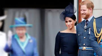 Rainha Elizabeth I ao lado do casal Harry e Meghan Markle - Getty Images