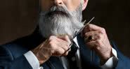 Imagem ilustrativa de um homem cortando a barba - Getty Images