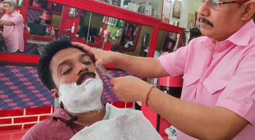 Imagem ilustrativa de homem fazendo a barba no cabeleireiro - Divulgação / Youtube / Daddy Barber