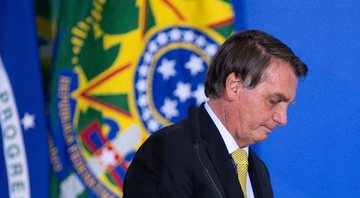 Bolsonaro cabisbaixo durante pronunciamento em 29 de junho - Getty Images