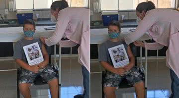 Caio, de sete anos, no momento da vacinação - Divulgação / Prefeitura de Arandu