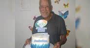 Na fotografia, Andrelino com seu bolo de aniversário - Divulgação / G1