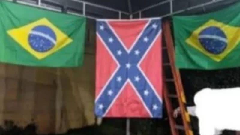Bandeira supremacista em meio a bandeiras do brasil - Divulgação / Twitter