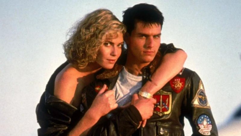Kelly McGillis e Tom Cruise em seus personagens de Top Gun