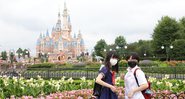 Visitantes com máscaras faciais no Walt Disney World - Getty Images