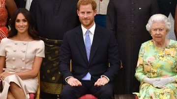 Harry ao lado de Meghan Markle e Elizabeth II - Getty Images