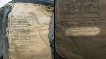 Calça jeans da Levi's com slogan racista na etiqueta. - Reprodução/liveauctioneers