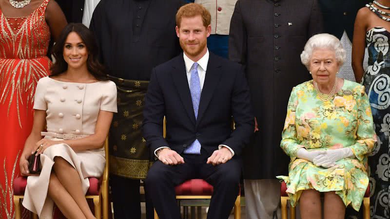 Meghan, Harry e Elizabeth II durante evento em 2018