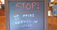 Aviso na entrada do estabelecimento: "Pare! Máscaras não são permitidas na loja" - Divulgação/Facebook