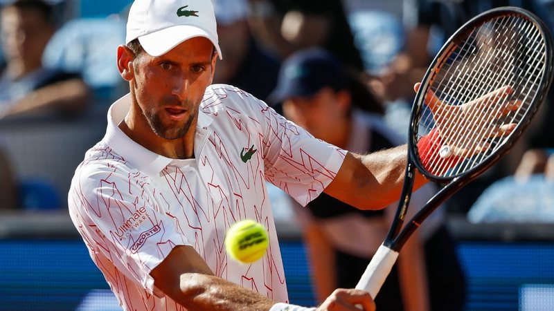 Novak Djokovic durante partida de tênis - Getty Images