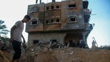 Prédio destruído na Palestina durante conflito contra Israel - Getty Images