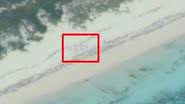 Pedido de socorro escrito em areia - Divulgação/U.S. Coast Guard