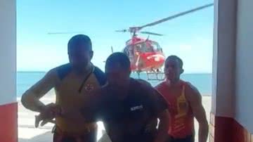 Nelson Nedy Ribeiro sendo resgatado pelos bombeiros - Reprodução/vídeo/G1