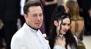 Grimes e Elon em evento - Getty Images