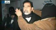 Saddam Hussein momentos antes de sua execução - Getty Images