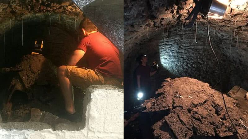 O homem, analisando as paredes do túnel com o auxílio de uma lanterna - Divulgação / SWNS.COM