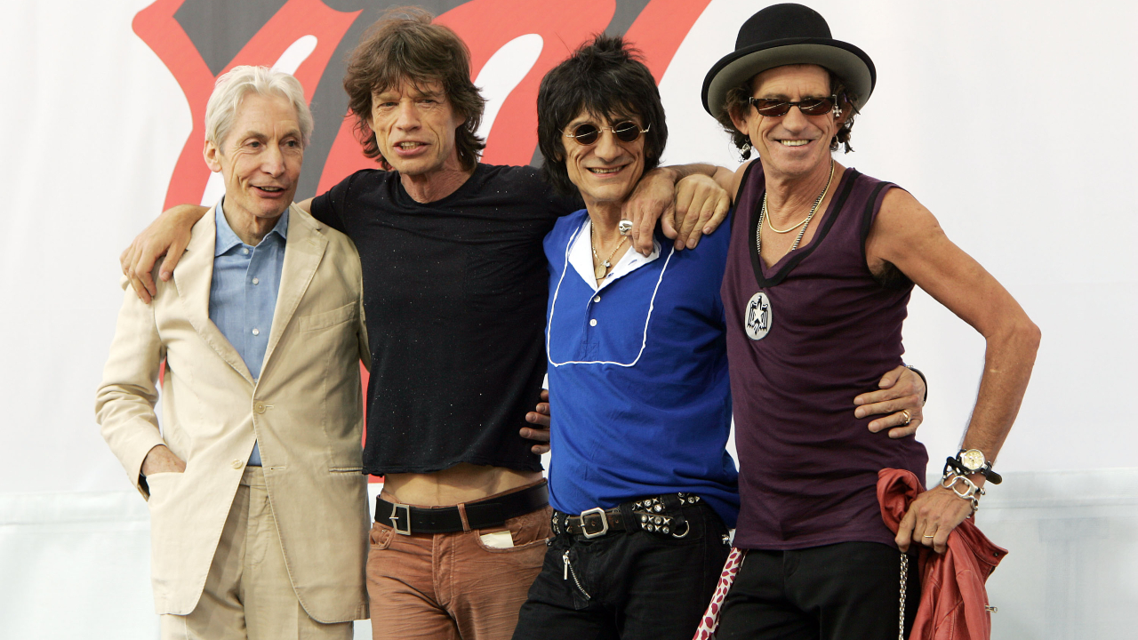 Integrantes dos Rolling Stones — respectivamente, Charlie Watts, Mick Jagger, Ron Wood e Keith Richards