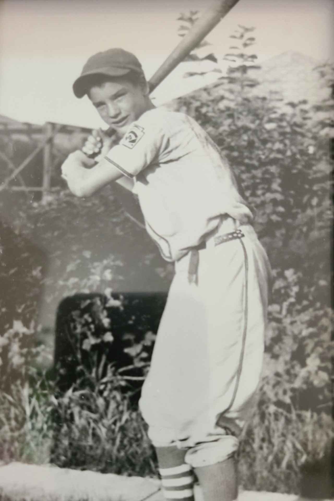 Foto de Jim Ward quando mais jovem, jogando baseball