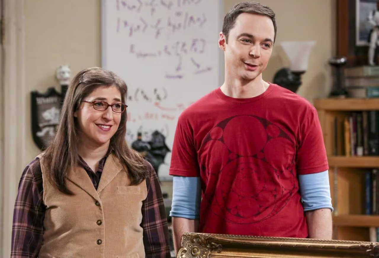 Amy e Sheldon, respectivamente