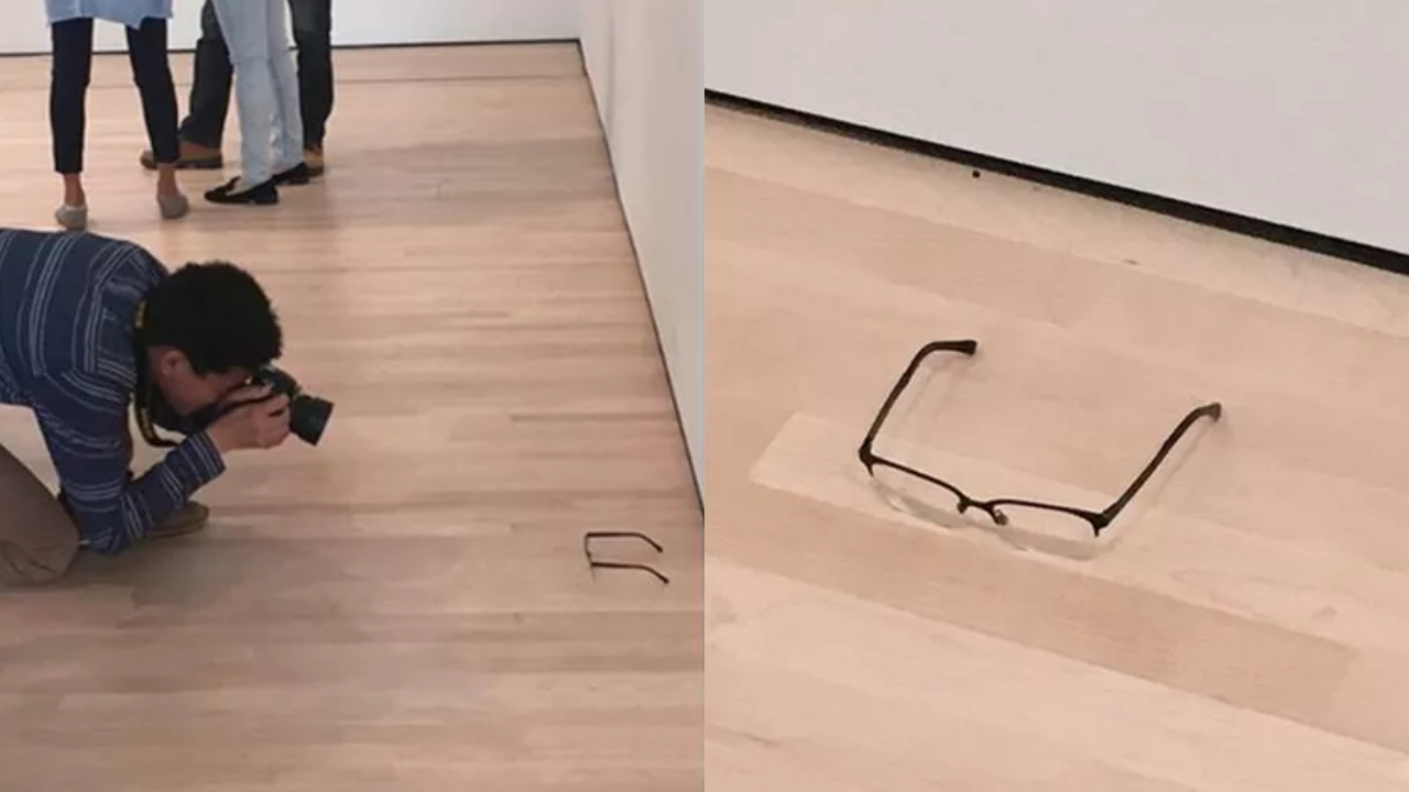 Visitante tirando foto dos óculos de TJ Khayatan, e o objeto em 'exposição'
